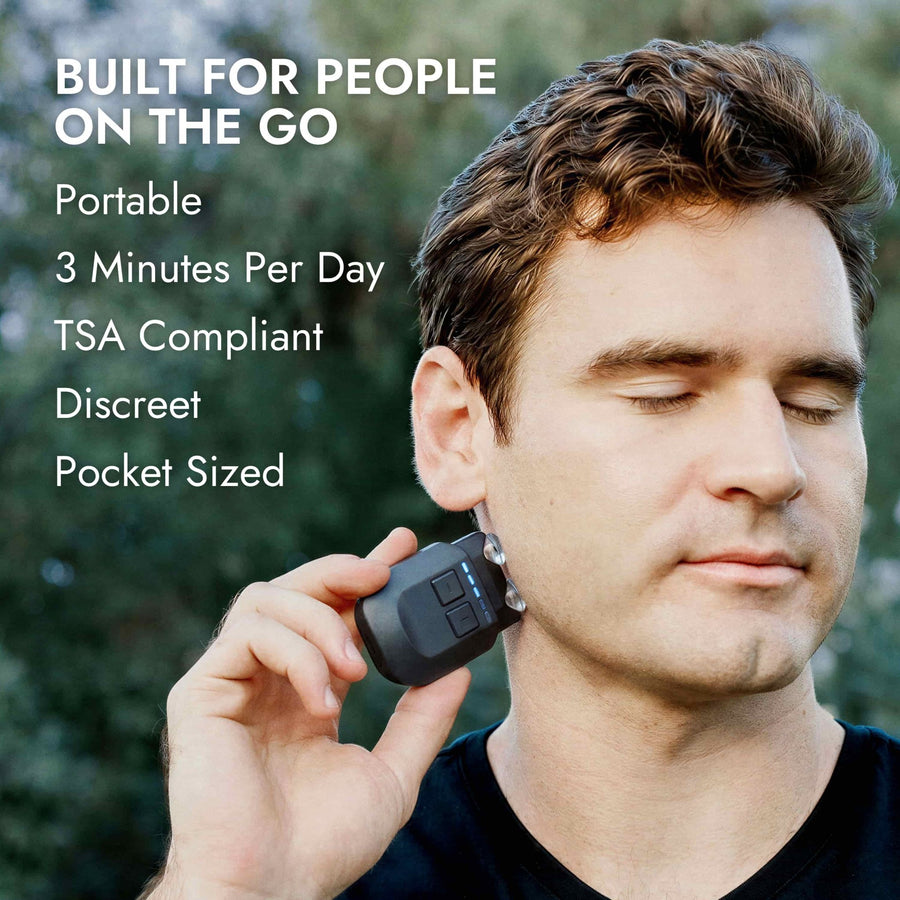 Man using VeRelief Prime against neck, built for people on the go